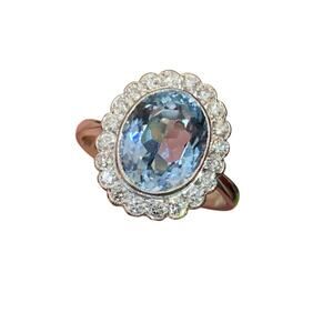 Blue oval ring - gold - CZs - Size 10.